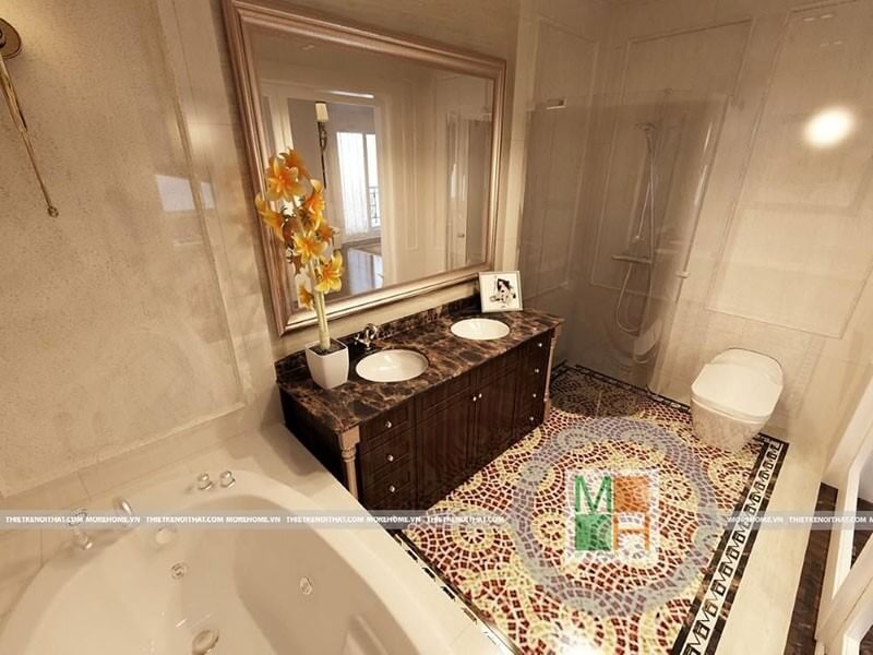 Thiết kế phòng tắm thoáng rộng với cách vật liệu từ đá ốp tường và kính cường lực tạo nên không gian ấn tượng và hiện đại